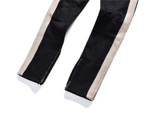 Load image into Gallery viewer, Distressed Knee Ripped Side Stripe Ankle Zipper Jeans